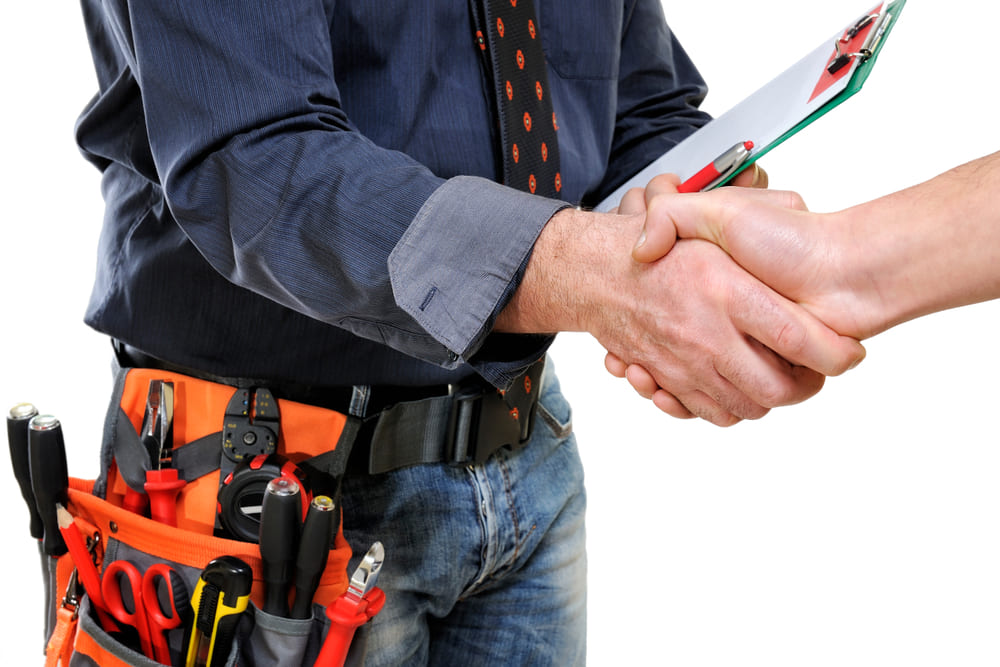 repairman-shaking-hands-with-customer