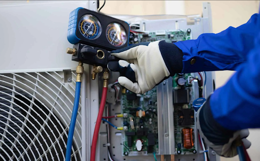 Heating and cooling technician repairing an HVAC system in Melbourne for reliable service.